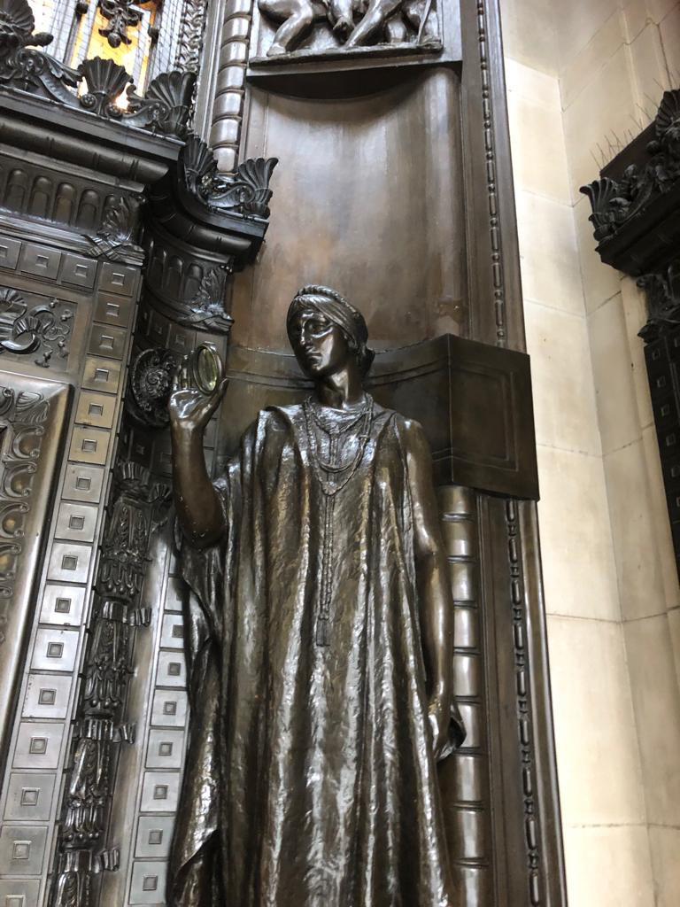 Completed cleaning of bronze statue and facade